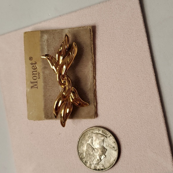 Monet Jewelry - Monet Gold Tone Twisted Bow Brooch Pin on vintage card. New old stock